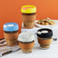 Silica Gel Glass Coffee Cup With Silica Strap Gripping Slanted Cap